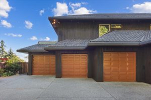Garage doors leading in to the three over-sized bays