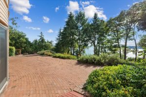 Brick patio overlooking Puget Sound in front of Great Room