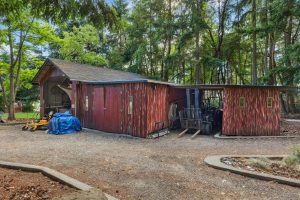 Open storage for RV or boat, with wood shop and covered parking for equipment