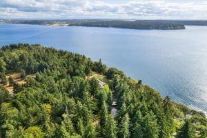 Overhead view of the Property, Puget Sound and Tacoma. Bottom middle of the image shows the two shops.