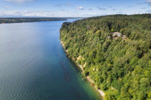 Spectacular view of Puget Sound up Vashon Island's west channel, with Gig Harbor and Olalla in the distance.