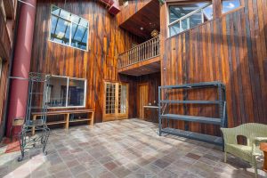 Solarium facing kitchen, inside deck and upstairs office window