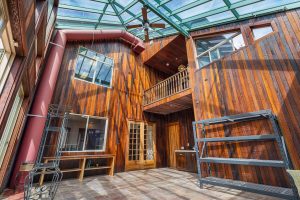 Solarium facing kitchen, inside deck and upstairs office window