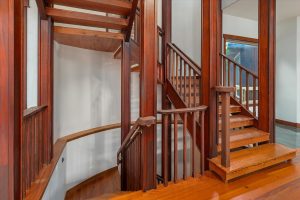 Custom stairwell leading to the lower and upper levels