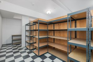 Storage area in finished basement, with non-bearing walls that can be removed